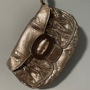 Anya Hindmarch copper small bag wristlet